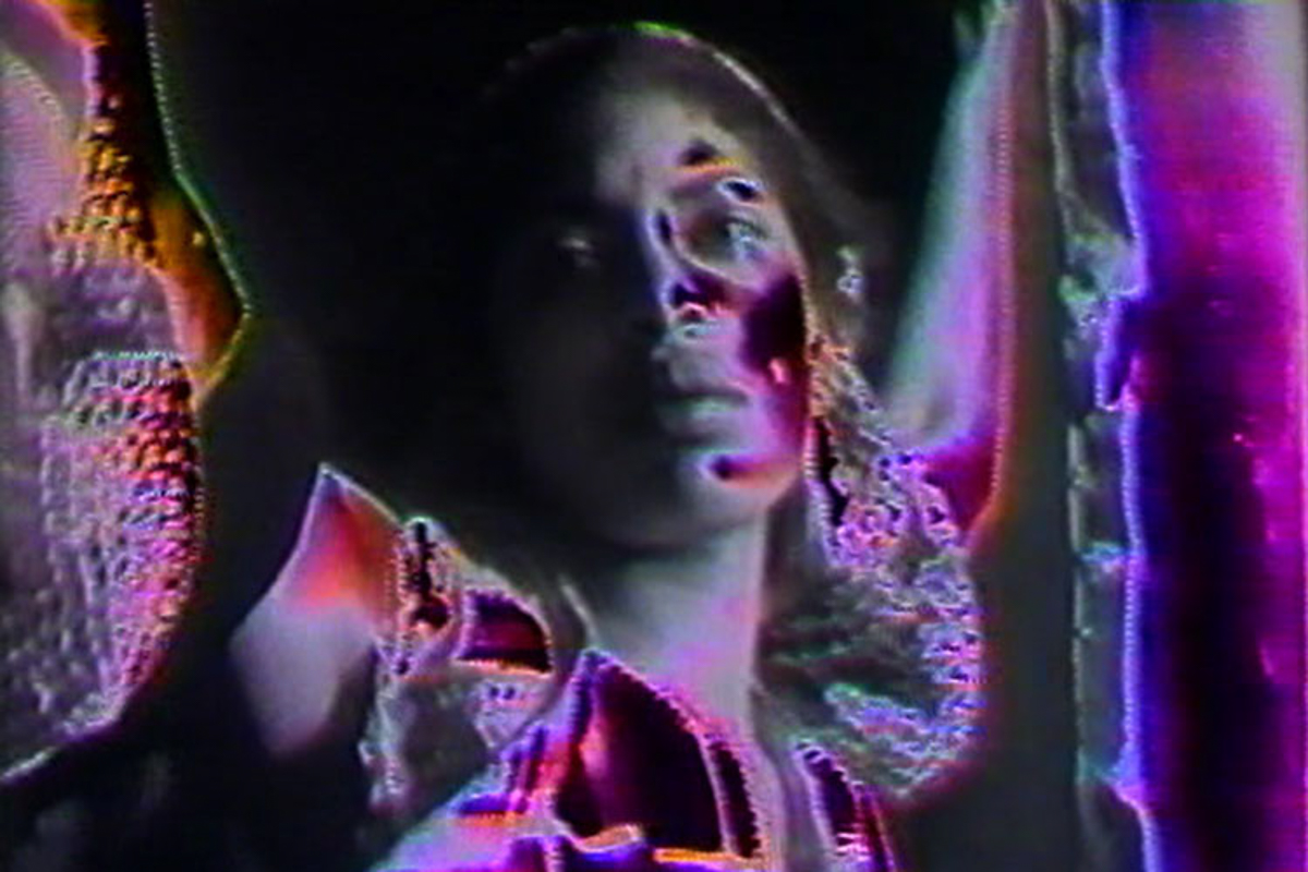 Still from Barbara McCullough's Shopping Bag Spirits and Freeway Fetishes: Reflections on Ritual Space, 1981. Digital video, color.