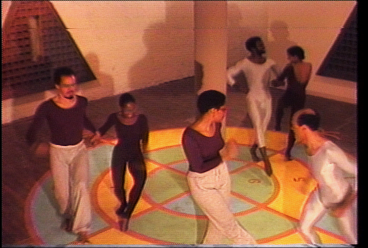Cake Walk (1983). Still from color video with sound, 26:28. Performance by Houston Conwill. Video and editing by Ulysses Jenkins. Courtesy of the artist.